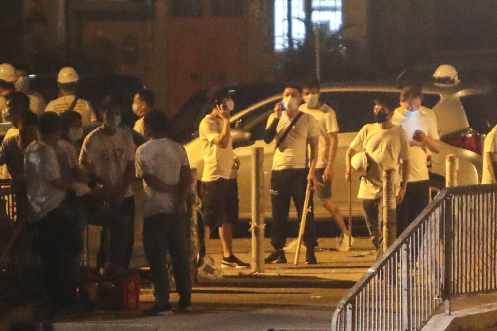 Men dressed in white T-shirts attacked people at Yuen Long MTR station on Sunday in an unprecedented display of violence. Photo: Winson Wong