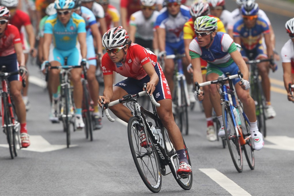 Wong Kam-po on his way to winning gold in the road race at the 2010 Asian Games in Guangzhou. Should he have tried his luck in Europe? Photo: SCMP