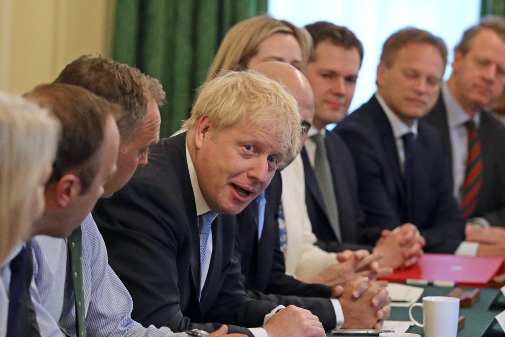 Britain’s PM Boris Johnson holds his first Cabinet meeting at 10 Downing Street in London. Photo: AFP