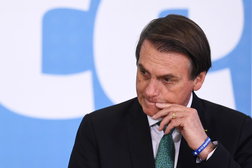 Brazilian President Jair Bolsonaro’s mobile phones were allegedly targeted by hackers. Photo: AFP