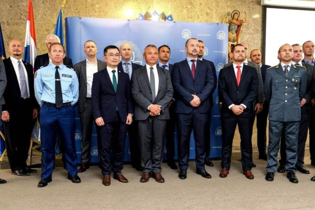 Barry Lai (second left front row), acting senior superintendent of Drug Investigation Bureau, at the press conference to announce the Balkan drug cartel bust in Croatia on Thursday. Photo: Handout
