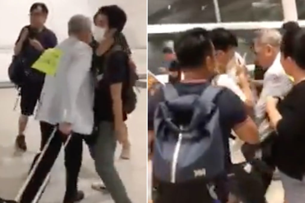 Protesters try to obstruct a man they accused of lashing out a protester from leaving the airport during a protest on Friday night. Photo: Facebook