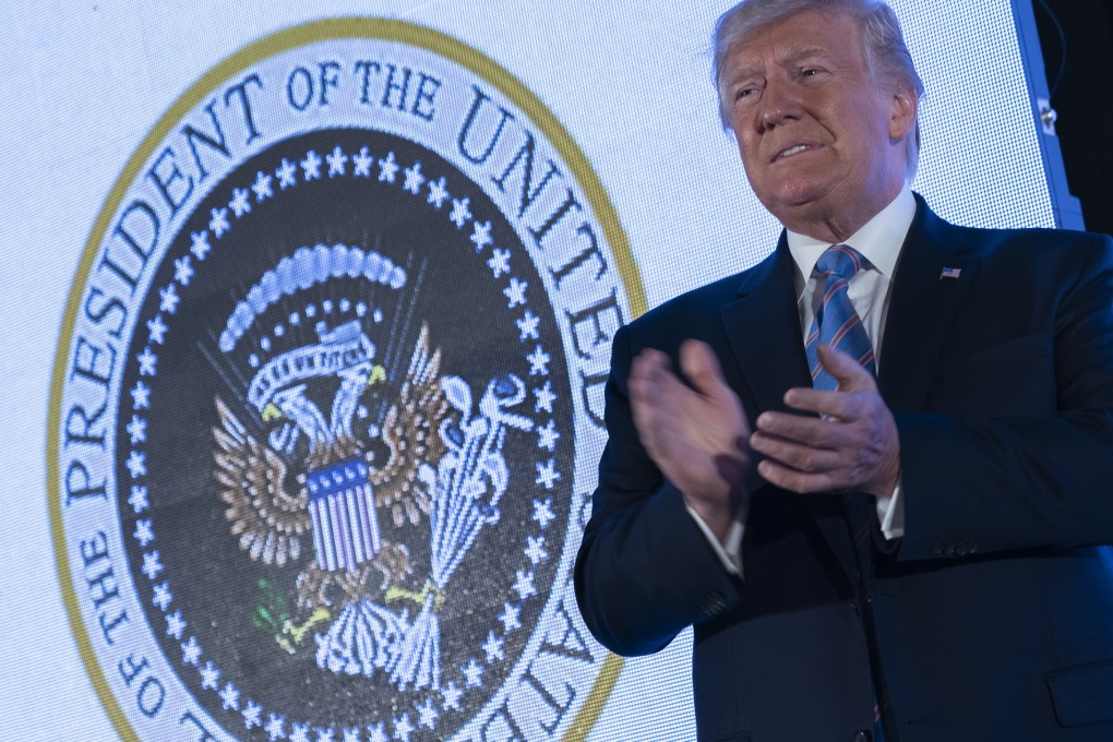 The seal was doctored to resemble Russia’s coat of arms, and added golf clubs. Photo: EPA