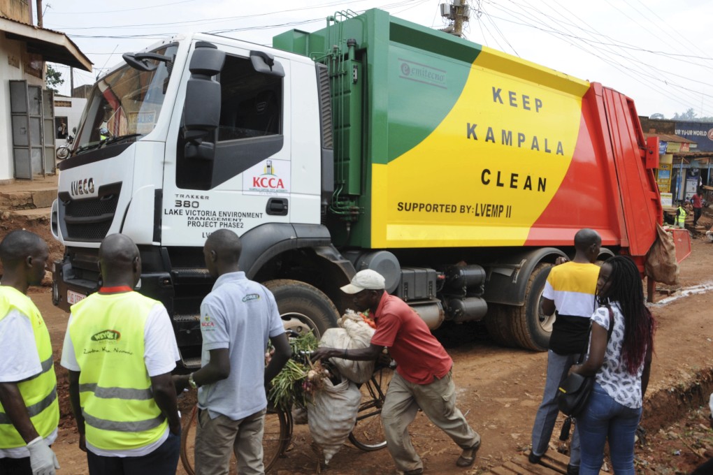 Kampala workers as part of the campaign to encourage people to keep their neighbourhood clean. Photo: AP