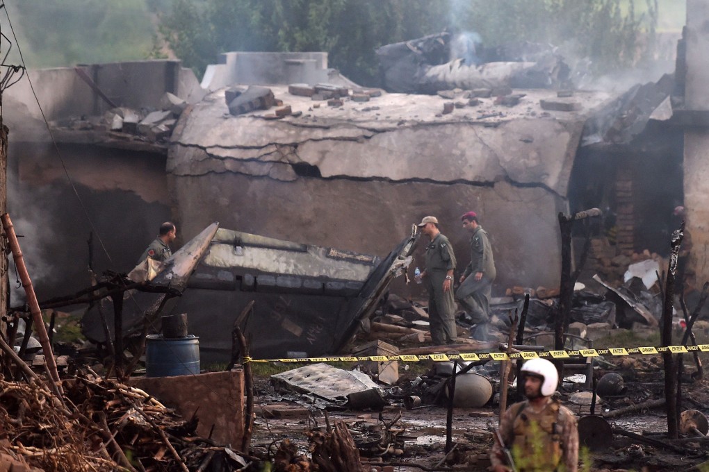 A Pakistani military plane crashed into a residential area in Rawalpindi. Photo: AFP