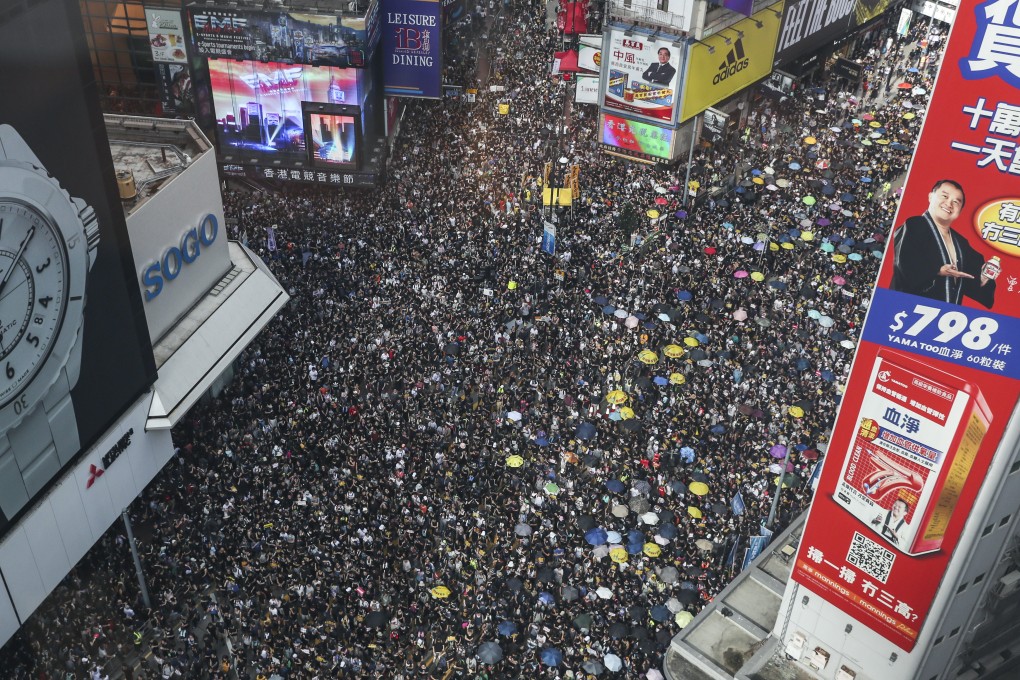 A sea of protesters on Hennessy Road, Causeway Bay, on July 21. Photo: Sam Tsang