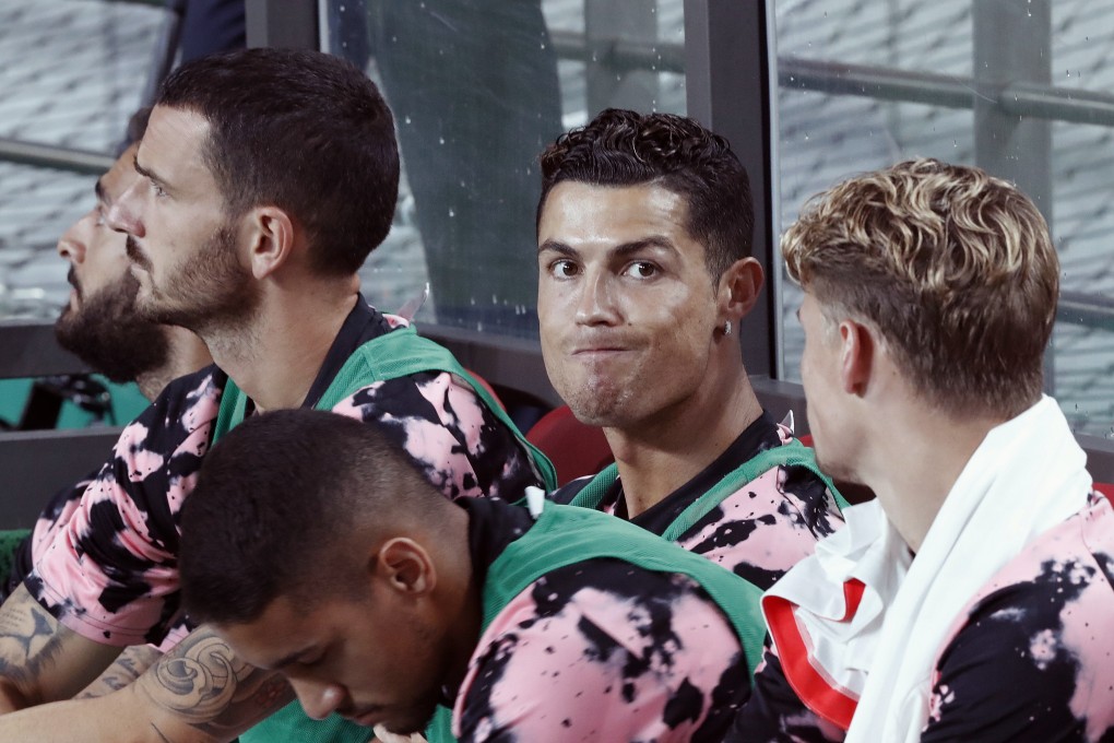 Cristiano Ronaldo sits on the bench before a friendly match against Team K League at the Seoul World Cup Stadium in Seoul. Photo: AP