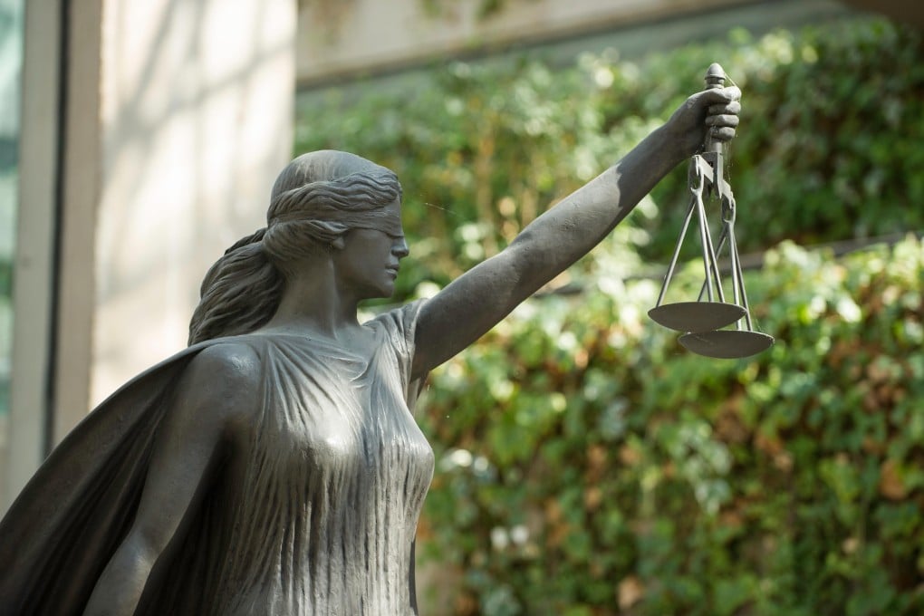 The statue of Lady Justice in the British Columbia Supreme Court complex in Vancouver. Photo: Alamy