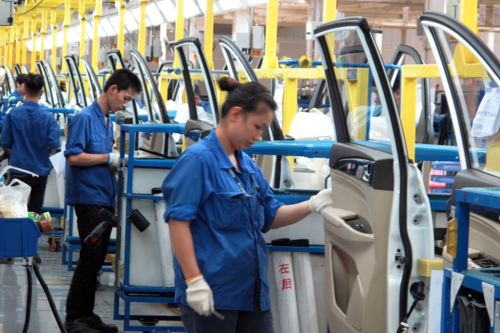 The official purchasing managers’ index (PMI) rose slightly to 49.7 from 49.4 in both May and June, the National Bureau of Statistics said on Wednesday. Photo: Reuters