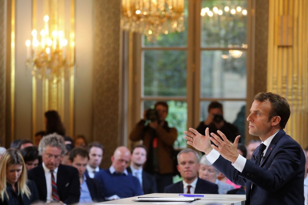 French President Emmanuel Macron delivers a nationally televised speech at the Elysee Palace in Paris on April 25 following a series of town halls held across the country to address the concerns of the “yellow vest” protesters. Photo: AFP