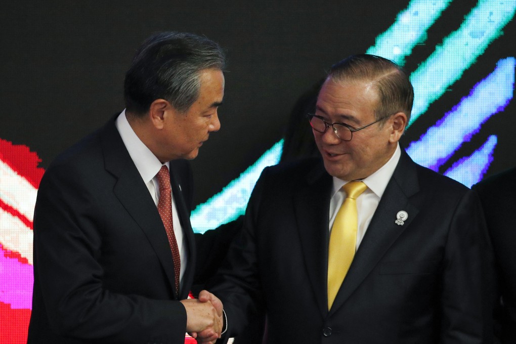 Chinese Foreign Minister Wang Yi with Philippines Secretary of Foreign Affairs Teodoro Locsin in Bangkok. Photo: EPA-EFE