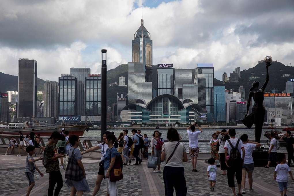 Slower growth in tourist arrivals was also blamed for weakened retail sales. Photo: AFP