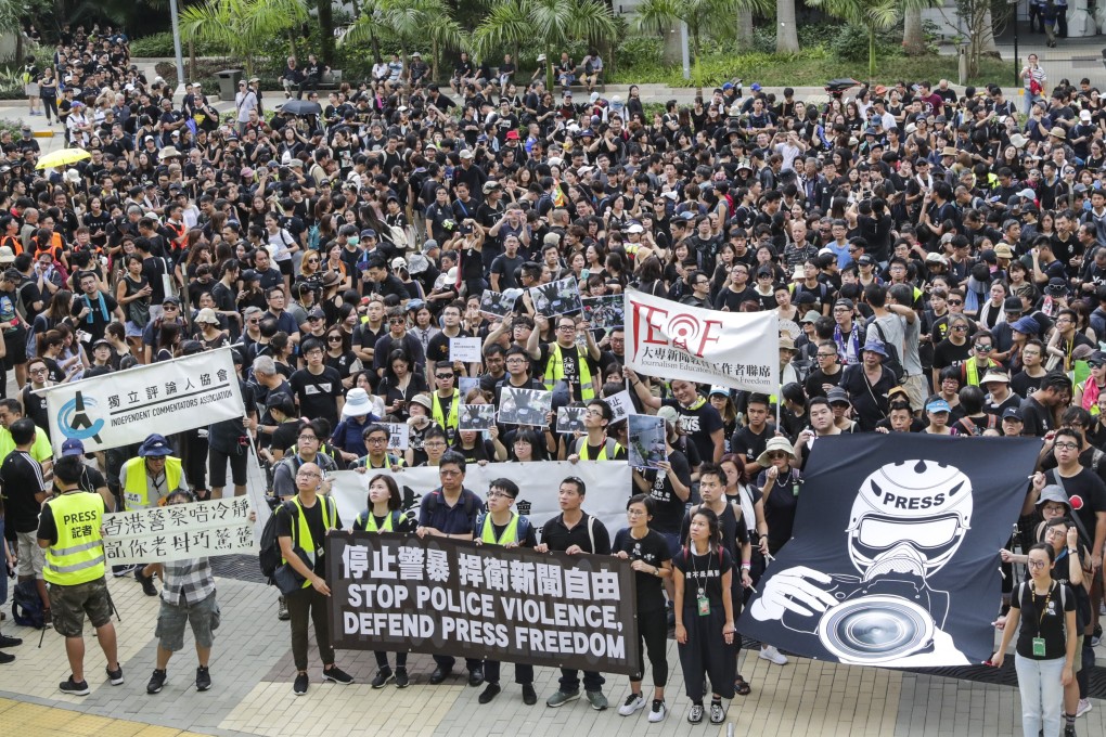 Journalists, press photographers, journalism schoolteachers and commentators take part in a silent march to the Chief Executive’s Office on July 14, calling for the defence of press freedom as extradition protests spark police action. Photo: Edmond So