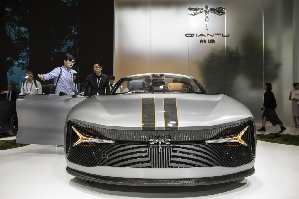 China slashed government subsidies on long range electric vehicles by up to 60 per cent in June. Photo: Bloomberg