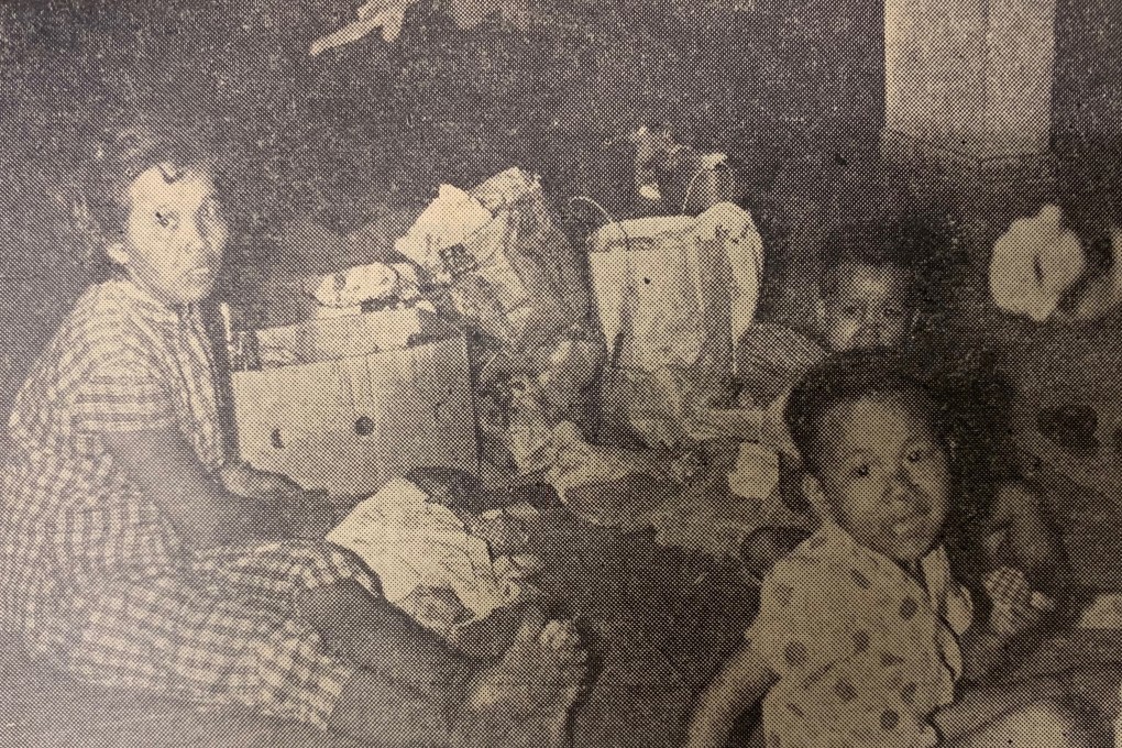 Survivors taking refuge in the covered playground of the Fuk Wing Street Government School appeared in the Post on August 3, 1962. Photo: SCMP