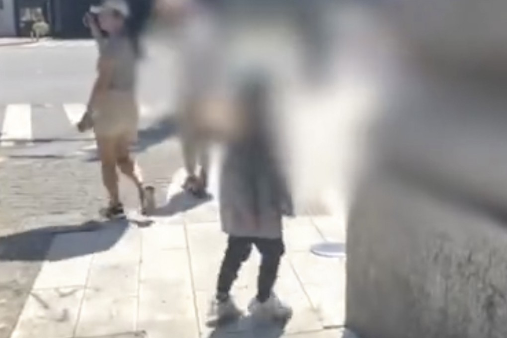 An unnamed person has sparked an online debate in China about the use of child models in out-of-season fashion shoots after taking pictures of a boy in winter clothing on a hot day in Shanghai. Photo: Weibo