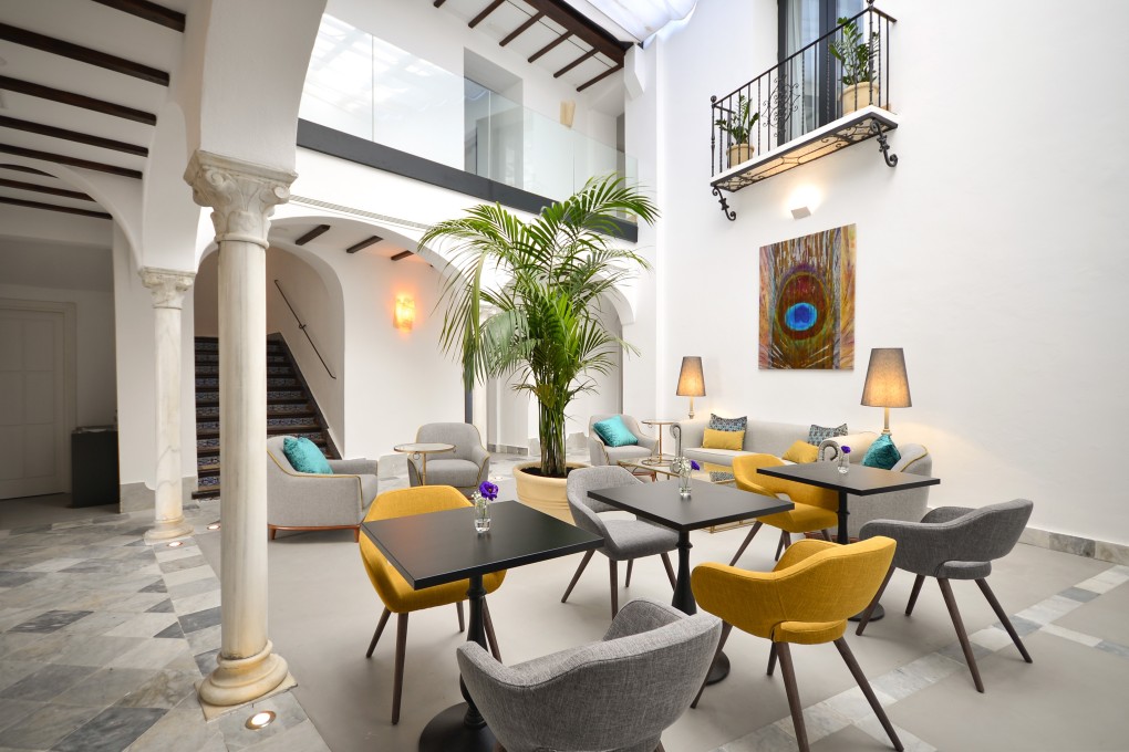 The covered courtyard of the Legado Alcázar Hotel, in Seville, Spain. Photo: Legado Alcazar Hotel