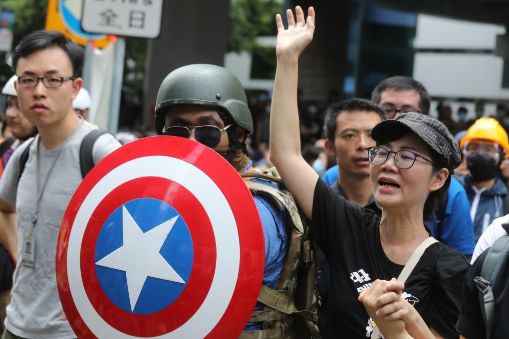 A man wielding a Captain America shield joins protesters blockading roads leading to the Hong Kong government headquarters in Tamar, Admiralty, on June 12. Photo: Dickson Lee
