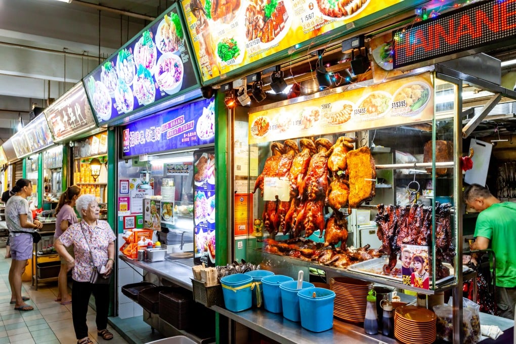 Hawker centres in Singapore house rows of stalls selling cheap and delicious food from Southeast Asia. Photo: Alamy