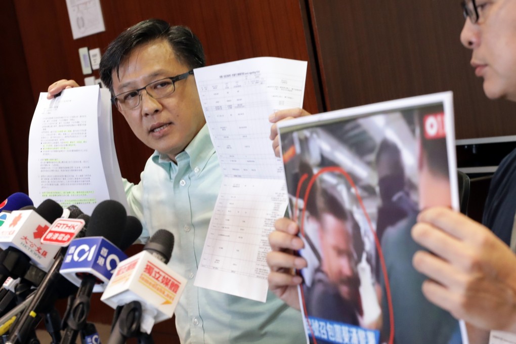 Junius Ho hits out at opposition lawmakers and unknown foreigners during a press conference on Friday. Photo: May Tse