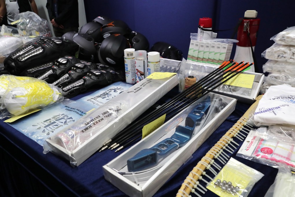 Items seized from a building in Sha Tin on Thursday on display at a press conference at Police Headquarters in Wan Chai. Photo: Edmond So