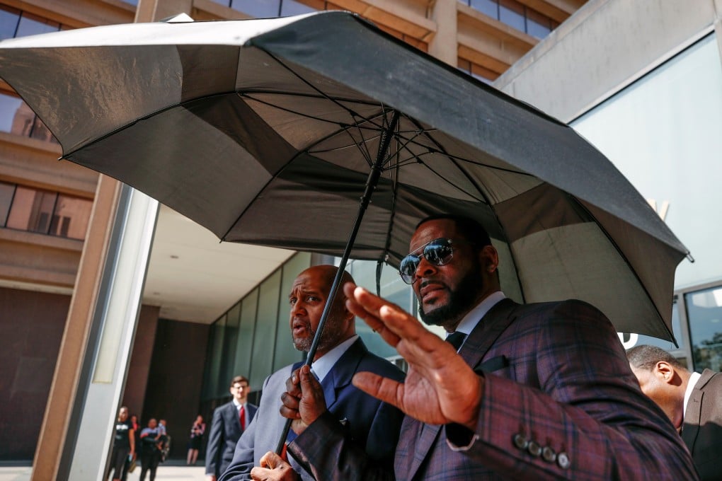 R. Kelly leaves the Leighton Criminal Court Building in Chicago after a hearing on sexual abuse charges in June. Photo: AFP