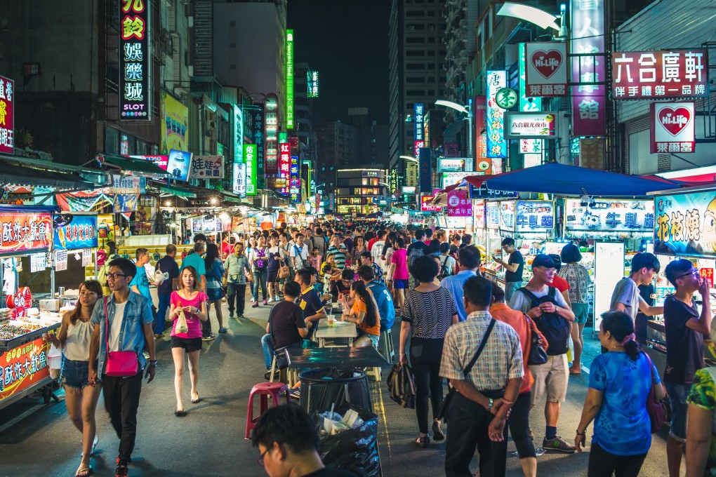 Tourists shop in the markets of the southern Taiwanese city of Kaohsiung. A ban on Chinese solo travellers visiting Taiwan could hurt bilateral relations by worsening anti-mainland sentiment on the island.