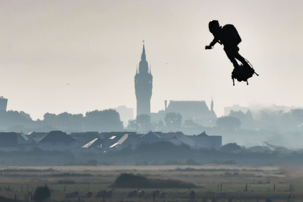 Franky Zapata passes Calais on his jet-powered ‘flyboard’ during the cross-Channel attempt on Sunday. Photo: AFP