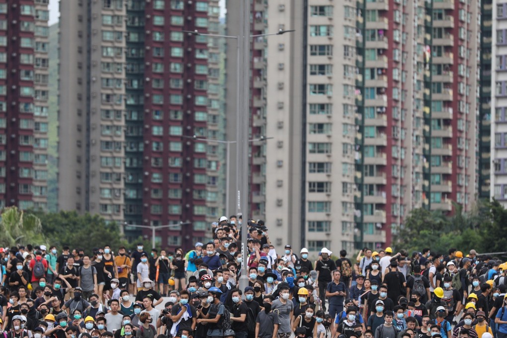 Extradition bill protesters at a mass rally in Yuen Long on July 27. Recent protests are one of the factors contributing to Hong Kong’s stagnant economy. Photo: EPA