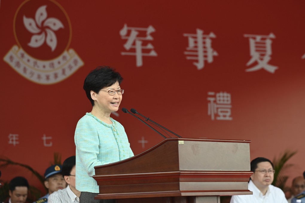 Chief Executive Carrie Lam attends the graduation ceremony for a PLA summer camp for Hong Kong youth at San Wai Barracks on July 28, the same day that protesters were driven from Beijing’s liaison office with tear gas, as Hong Kong continues a third weekend of violence. Photo: Hong Kong’s Information Services Department