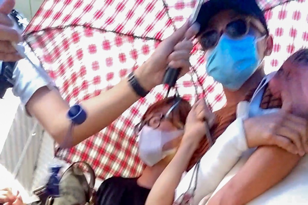 Filipino dancer Jethro Santiago Pioquinto (right) leaves court. Photo: Brian Wong