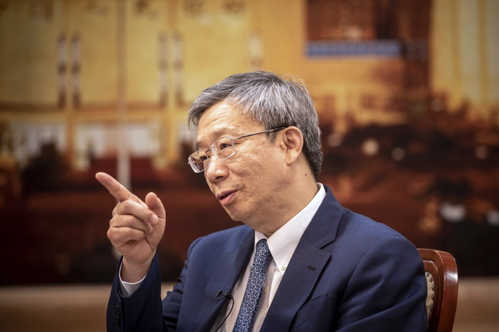 Yi Gang, governor of the People's Bank of China, talks during an interview in Beijing on June 7. Due to the priority Beijing places on deleveraging, few analysts anticipate that the PBOC will join the global trend of policy easing. Photo: Bloomberg
