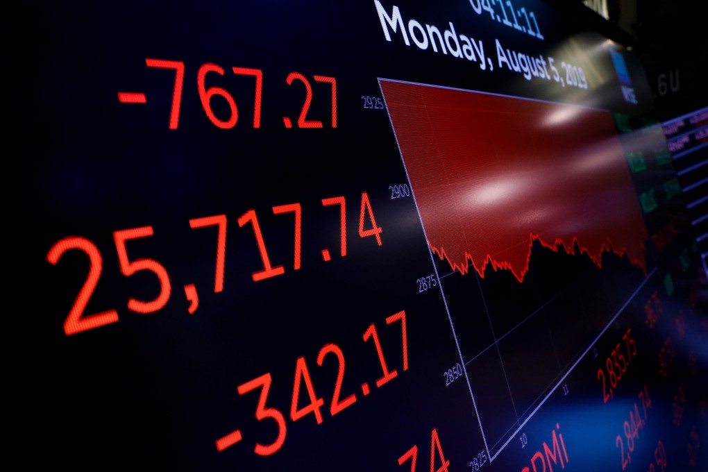 A board above the floor of the New York Stock Exchange shows the falling Dow Jones Industrial Average on Monday. Photo: AP