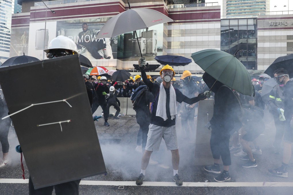 Tear gas is used on anti-government protesters after they occupy Harcourt Road in Admiralty during another day of unrest on Monday. Photo: Sam Tsang
