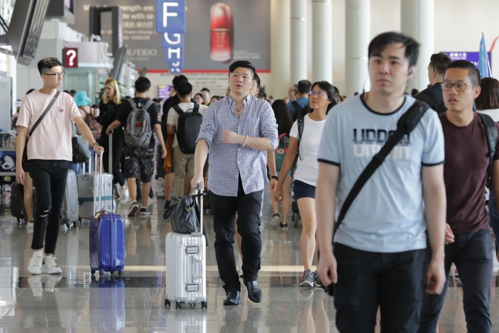 Hundreds of flights were cancelled at Hong Kong International Airport on Monday, leaving passengers stranded and others unable to land. Photo: May Tse