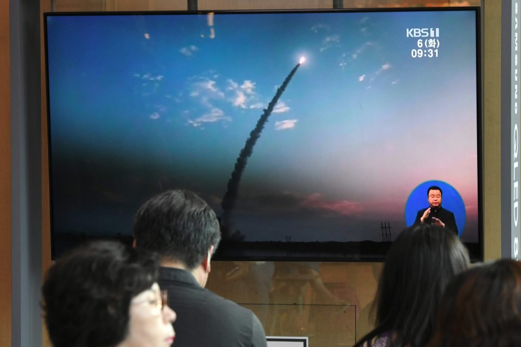 People watch footage of North Korea's missile launch at a railway station in Seoul on Tuesday. Photo: AFP
