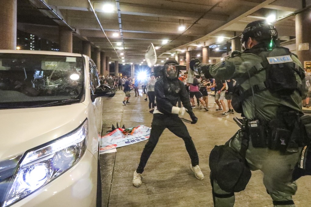 Riot police and anti-extradition protesters clash in Wong Tai Sin on August 3. Photo: Felix Wong