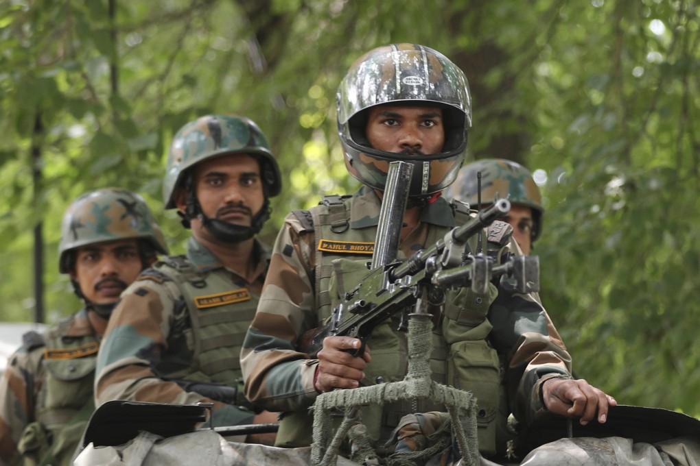 Indian army soldiers keep guard in Srinagar, Kashmir. Analysts from China and India are optimistic that the latest dispute in the region will not throw bilateral ties off track. Photo: AP