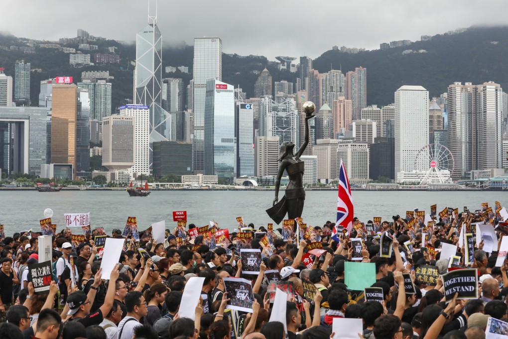 A Hong Kong protest on Tsim Sha Tsui waterfront, a popular tourist attraction in the city. Photo: Felix Wong