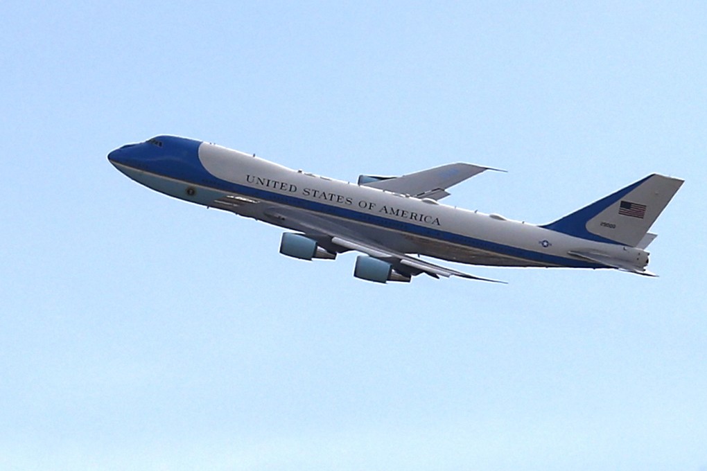 Air Force One flies over the Walmart and a makeshift memorial, as US President Donald Trump pays a visit in the wake of a mass shooting, in El Paso, Texas. Photo: EPA