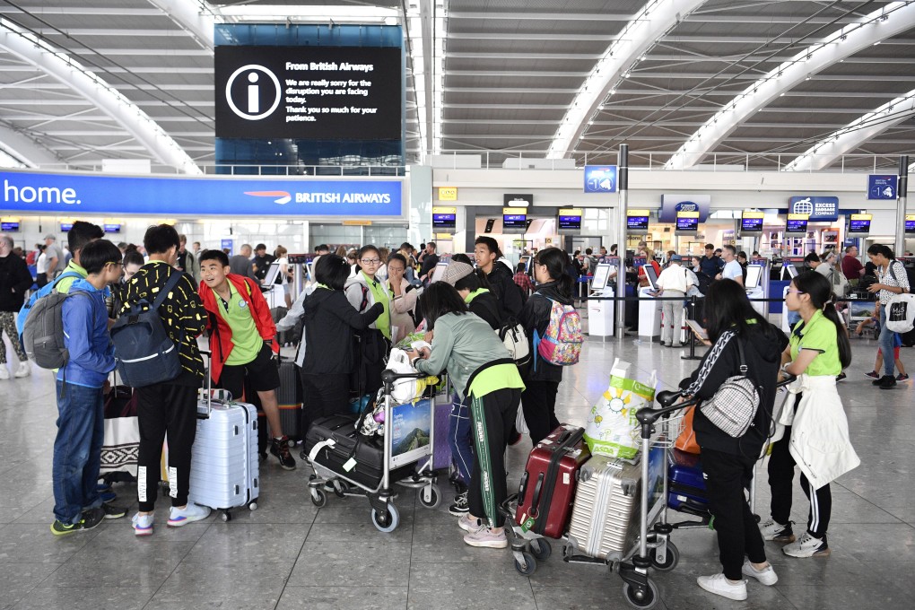 Passengers wait in the departures lounge at Heathrow Airport Terminal 5 on Wednesday. Photo: EPA-EFE