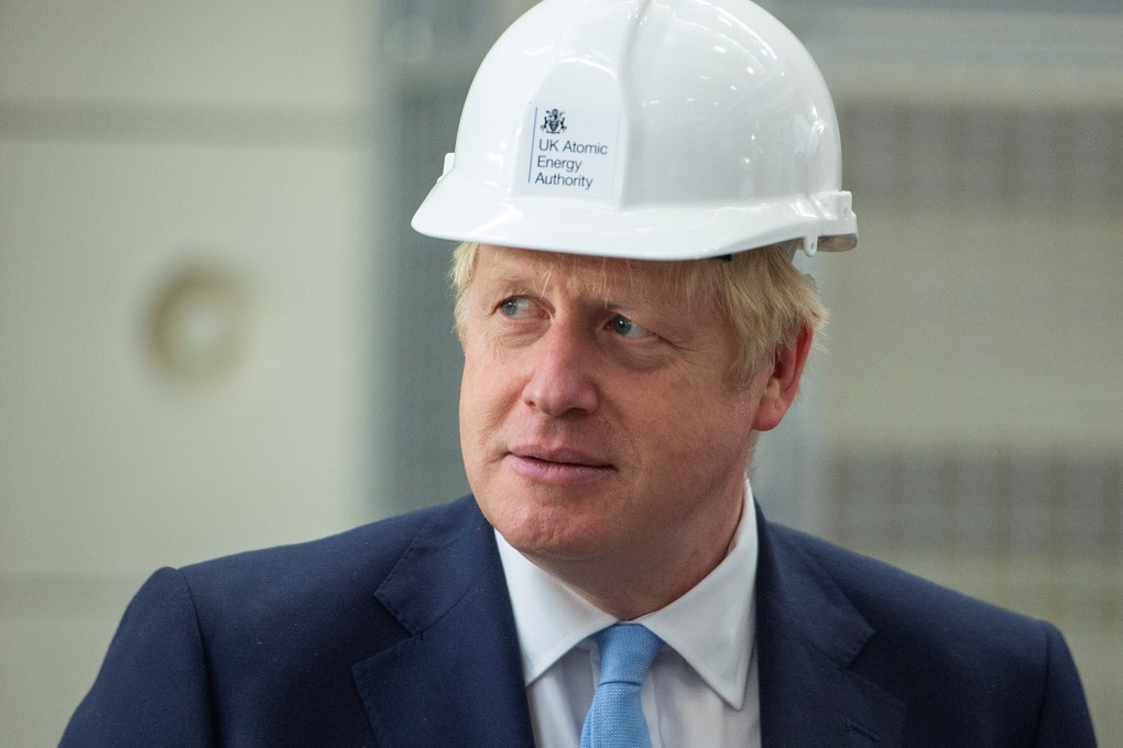 Britain's Prime Minister Boris Johnson wore a hard hat on Thursday. Photo: Reuters
