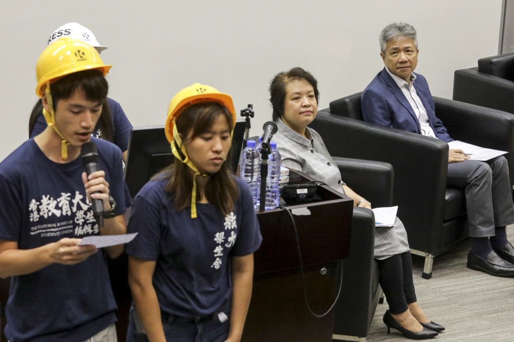 The Education University of Hong Kong’s president Prof Stephen Cheung (right) and assistant director of student affairs Angie Yeon (second from right) at a dialogue with students on Friday. Photo: May Tse