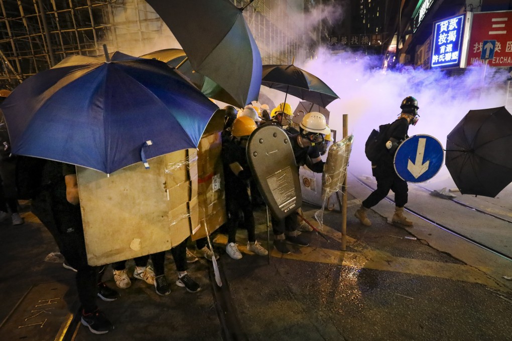 Extradition bill protesters set up defences in Central district. Photo: James Wendlinger