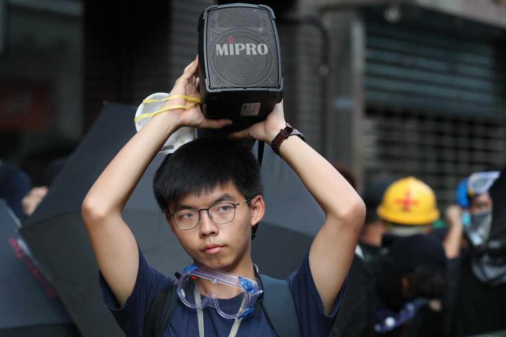 Pro-democracy activist Joshua Wong attends a rally against police brutality in Hong Kong on July 28. Photo: EPA-EFE
