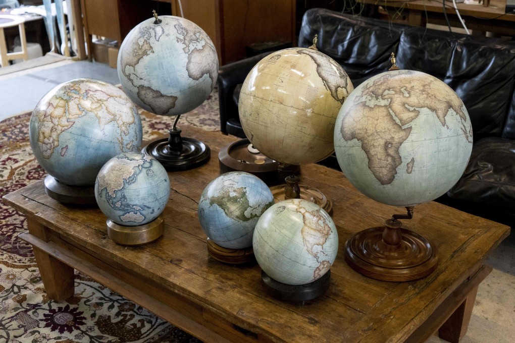 Globes on display at Bellerby and Co Globemakers’ workshop and headquarters in Stoke Newington in north London. Photo: AFP