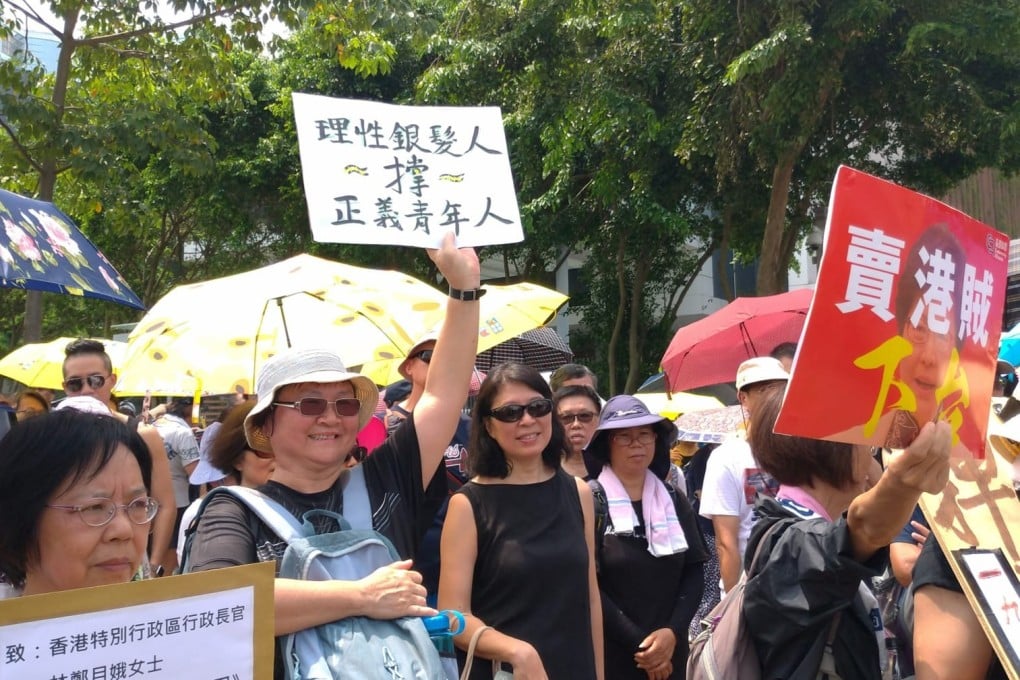 Senior citizens marched from police headquarters to the Chief Executive’s Office. Photo: Holly Chik