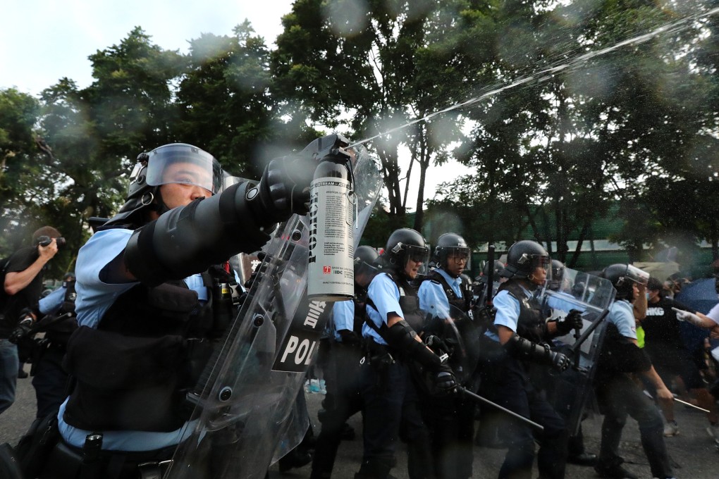 Protesters clash with police after a march in Sheung Shui on July 13, 2019. Photo: Felix Wong