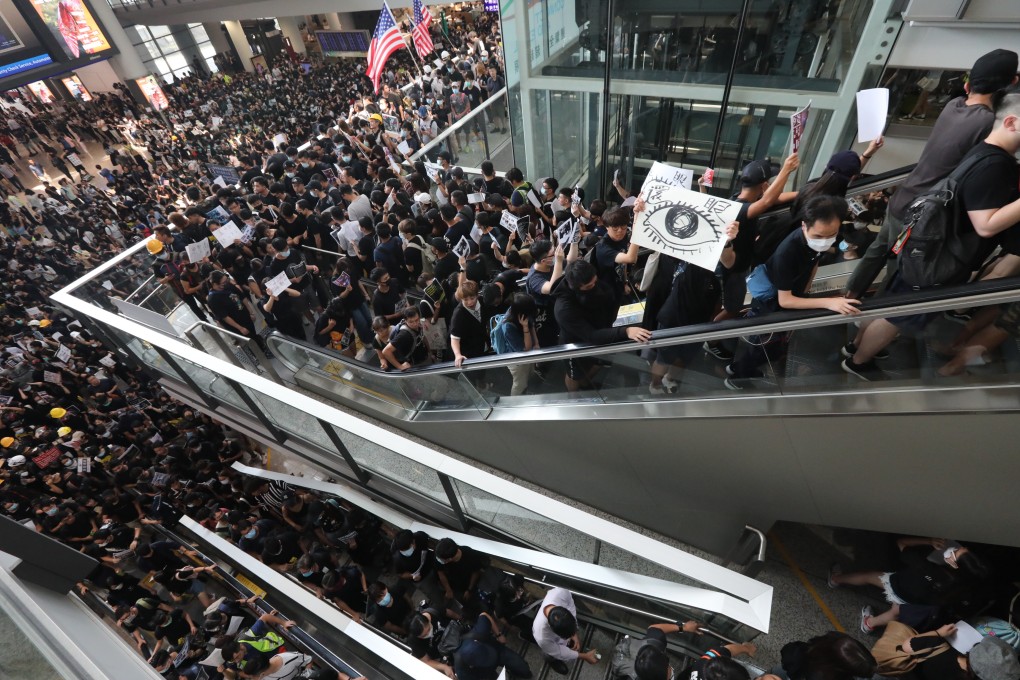 Anti-government protesters filled parts of the airport on Monday. Photo: Felix Wong