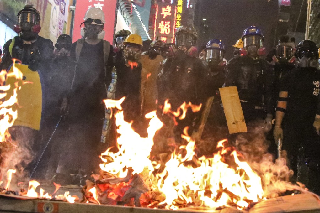 Anti-extradition bill protesters set fire to objects to obstruct Nathan Road in Mong Kok on August 3. Dousing all hope for protesters will only fire up their desperation in a nihilistic battle to the end. Photo: Felix Wong